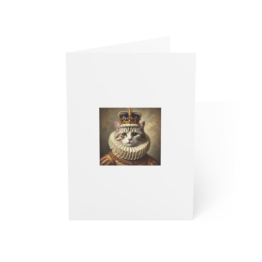 Cat wearing a crown and white robe on a white background