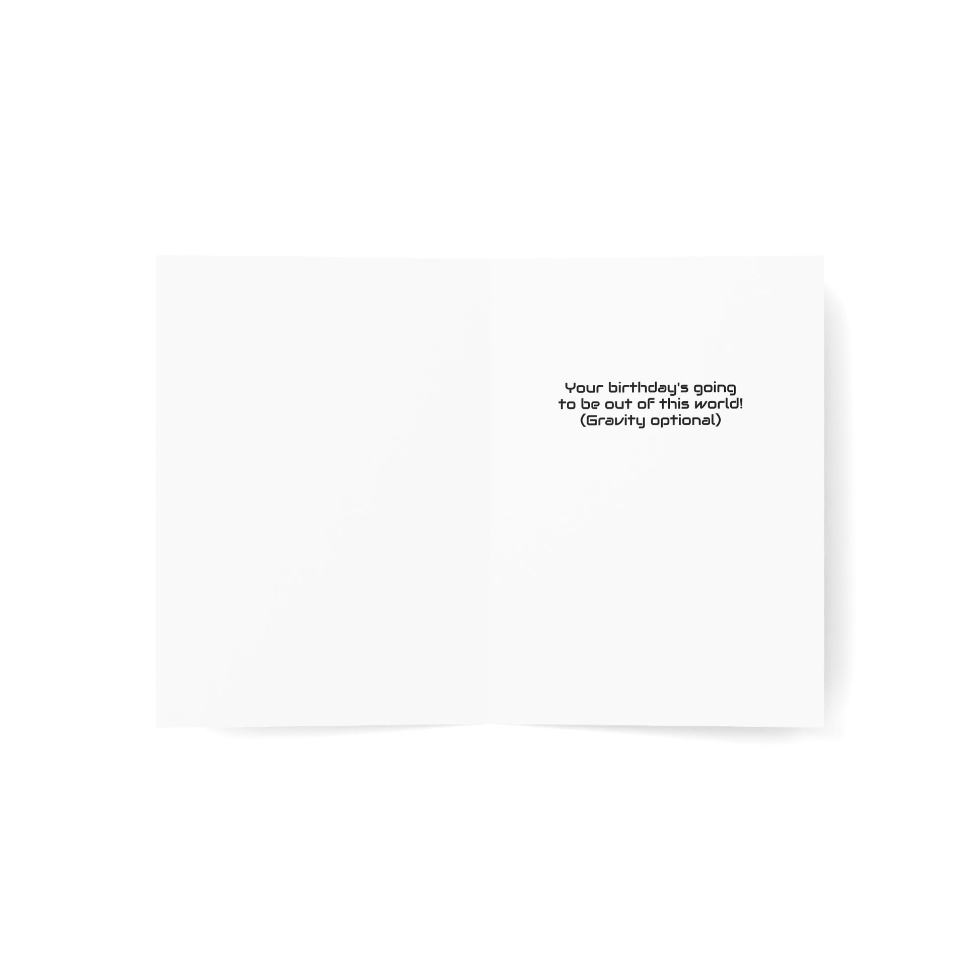 Birthday card on white background, text in card reads "Your birthday's going to be out of this world! (Gravity optional)"